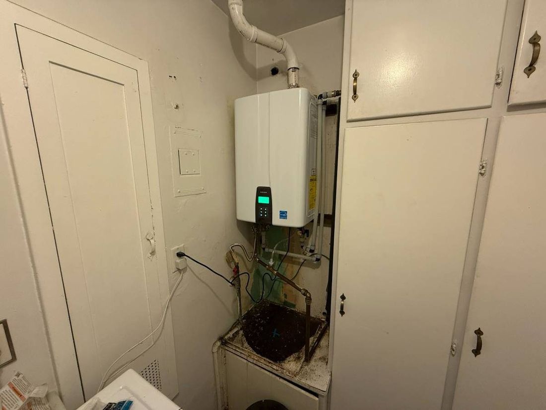 Navien tankless installed in a laundry room