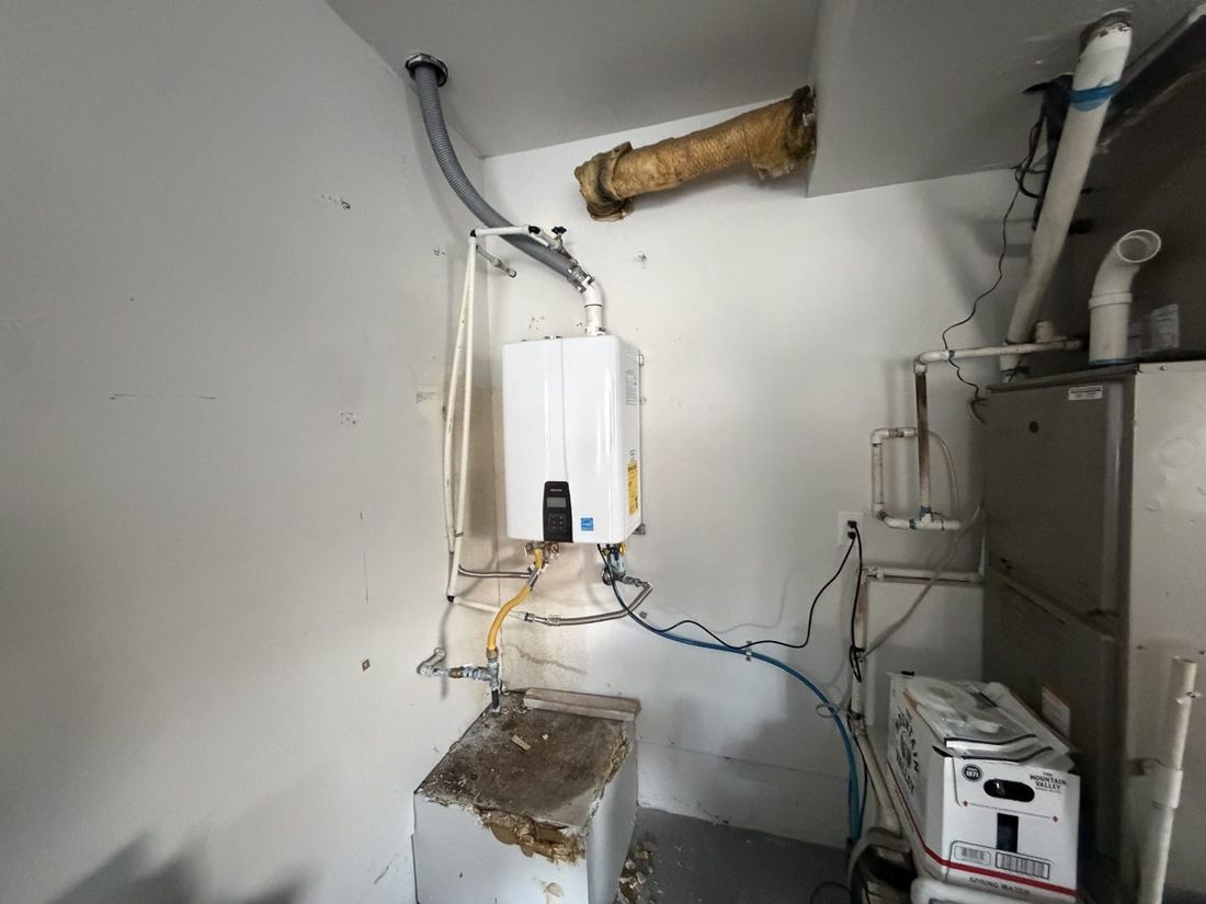 Navien tankless installed in a utility room
