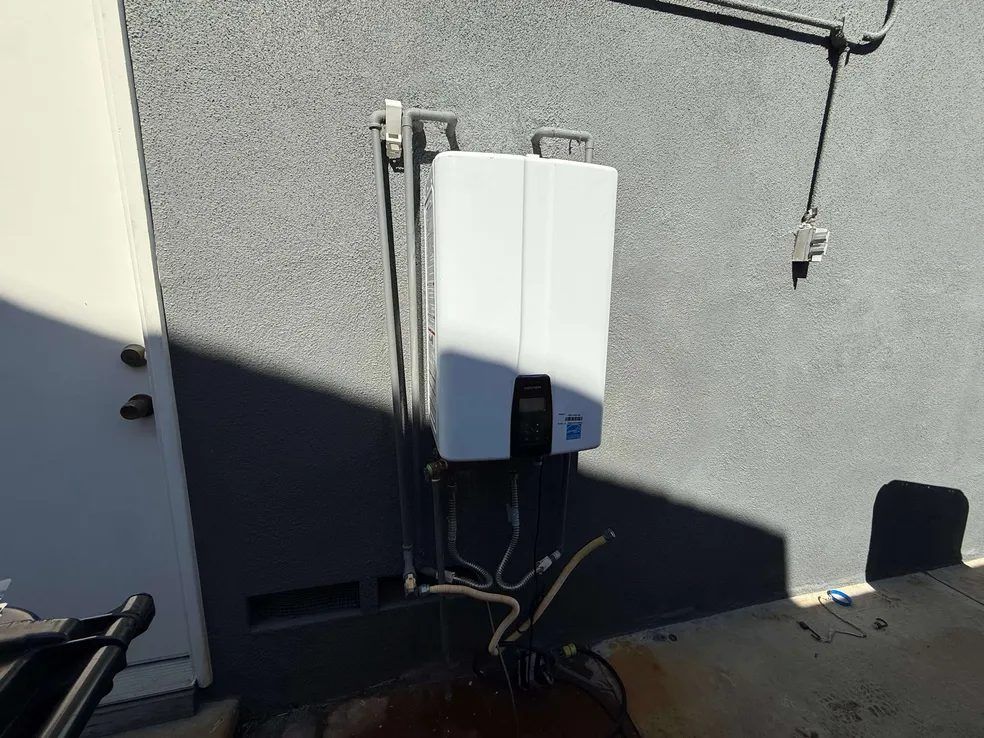 New Navien tankless installed on an exterior wall