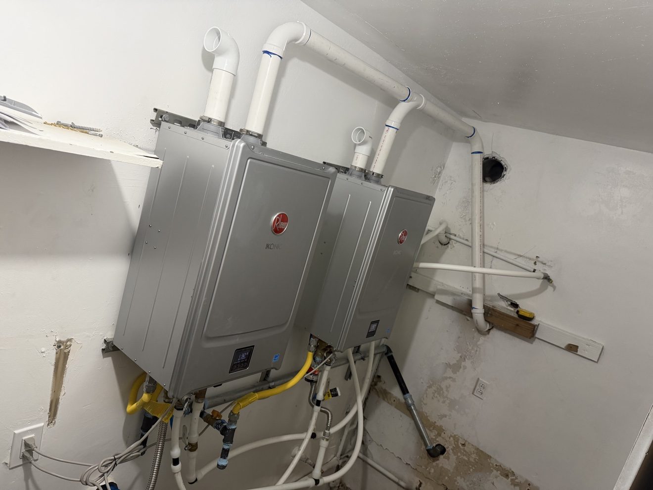 Two Rheem IKONIC tankless units